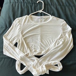 Fashion nova white wrap around shirt. Never worn, no tags